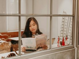 girl reading business magazine