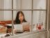 girl reading business magazine