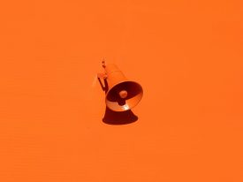 orange announcement speaker